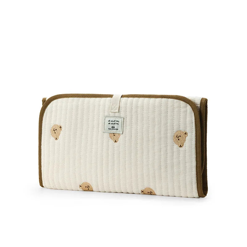 Tapis langer beige avec ours