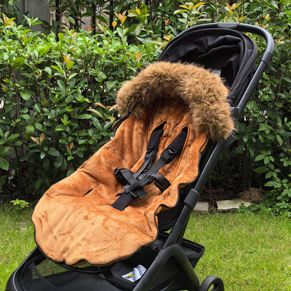 Chancelière poussette Marron douce sur une poussette noire