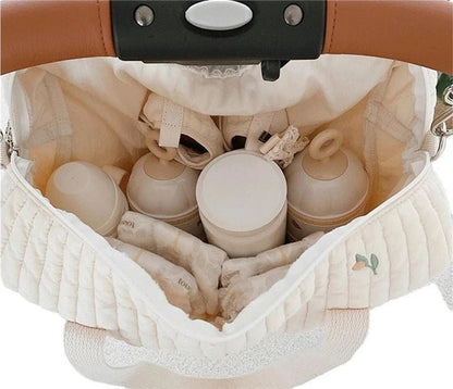 Sac à langer pratique ouvert avec accessoires de bébé – AstuceBambin